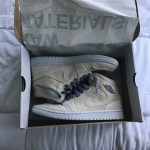 Woman’s midnight sand drift jordan 1 mid